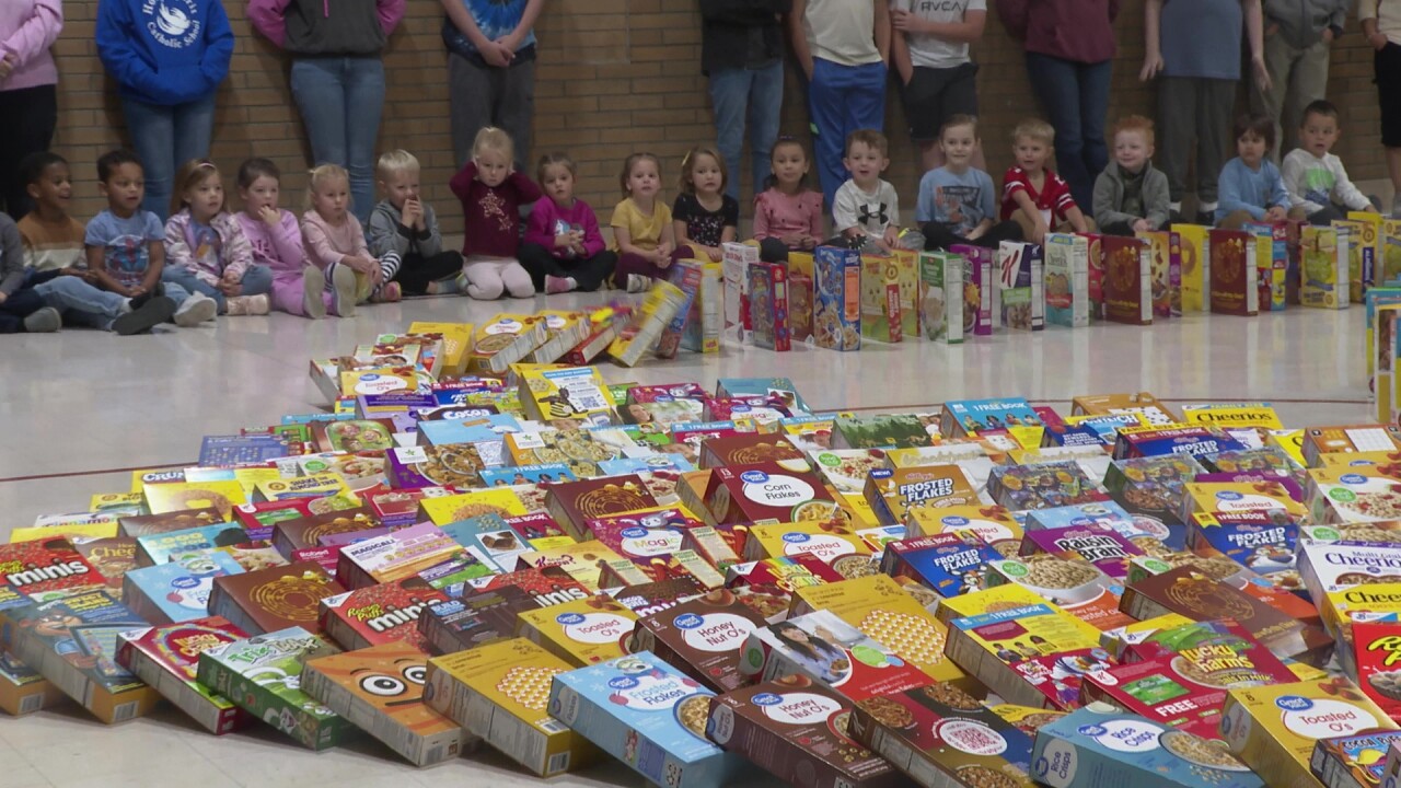 School does 'Domino Run' before donating to Great Falls food bank