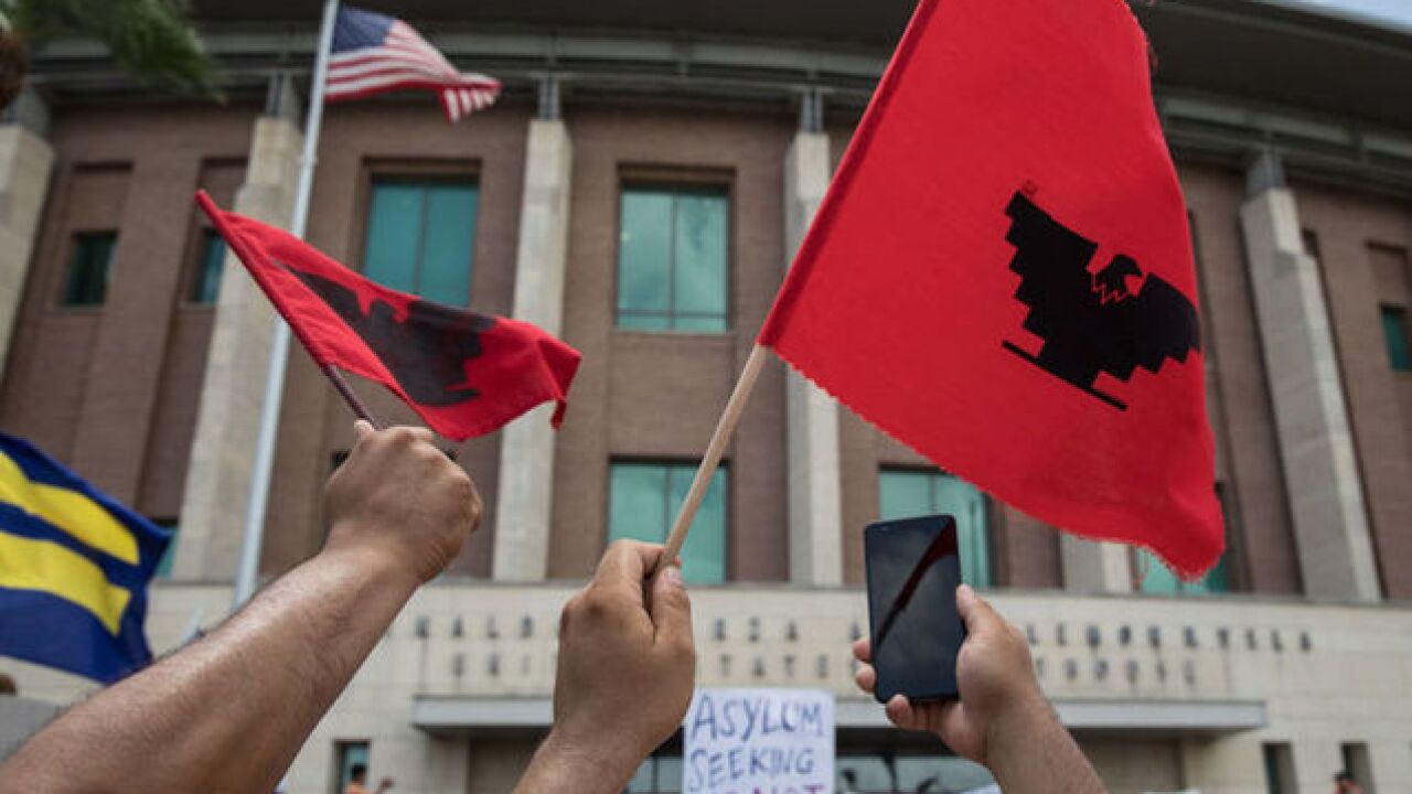 Federal judge pauses deportations of reunited families