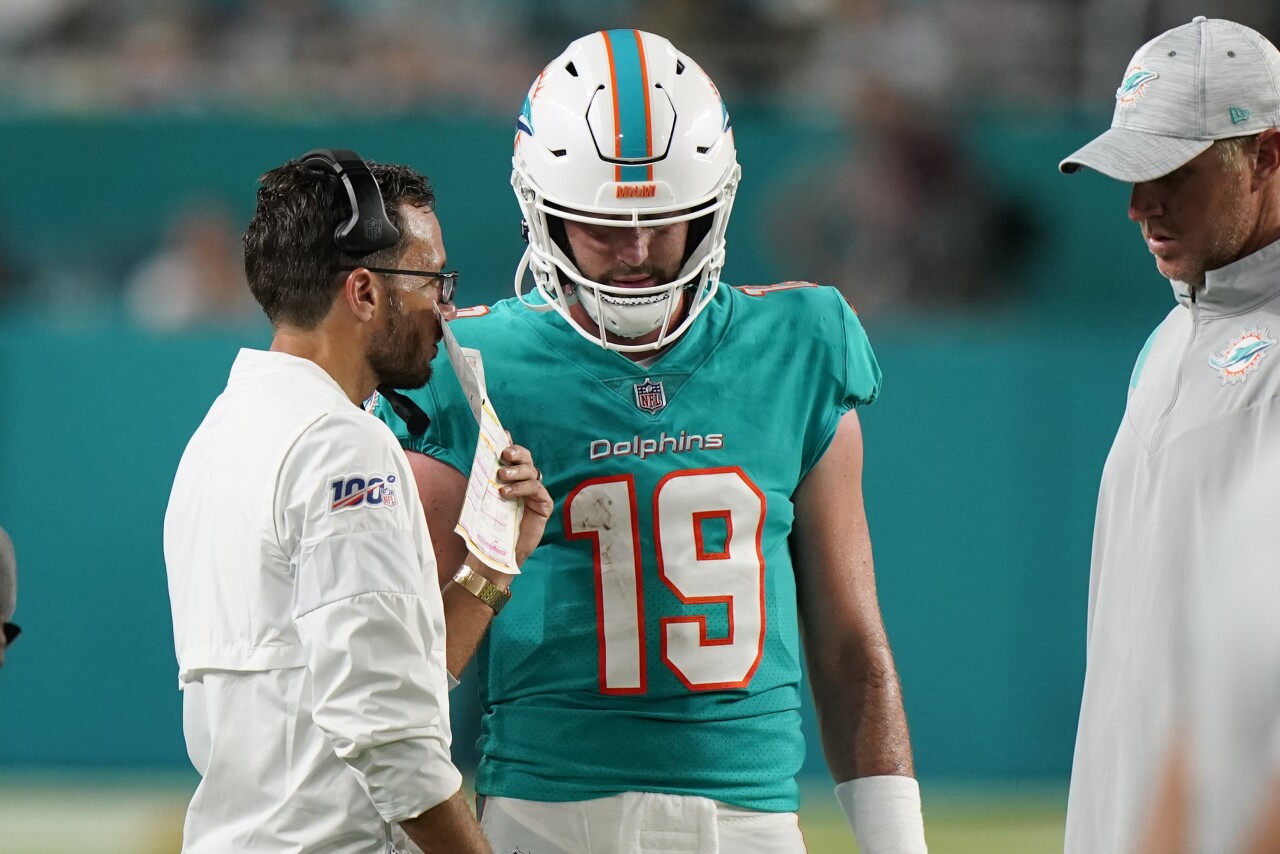 Miami Dolphins head coach Mike McDaniel talks to QB Skylar Thompson during second half of preseason game vs. Las Vegas Raiders, Aug. 20, 2022