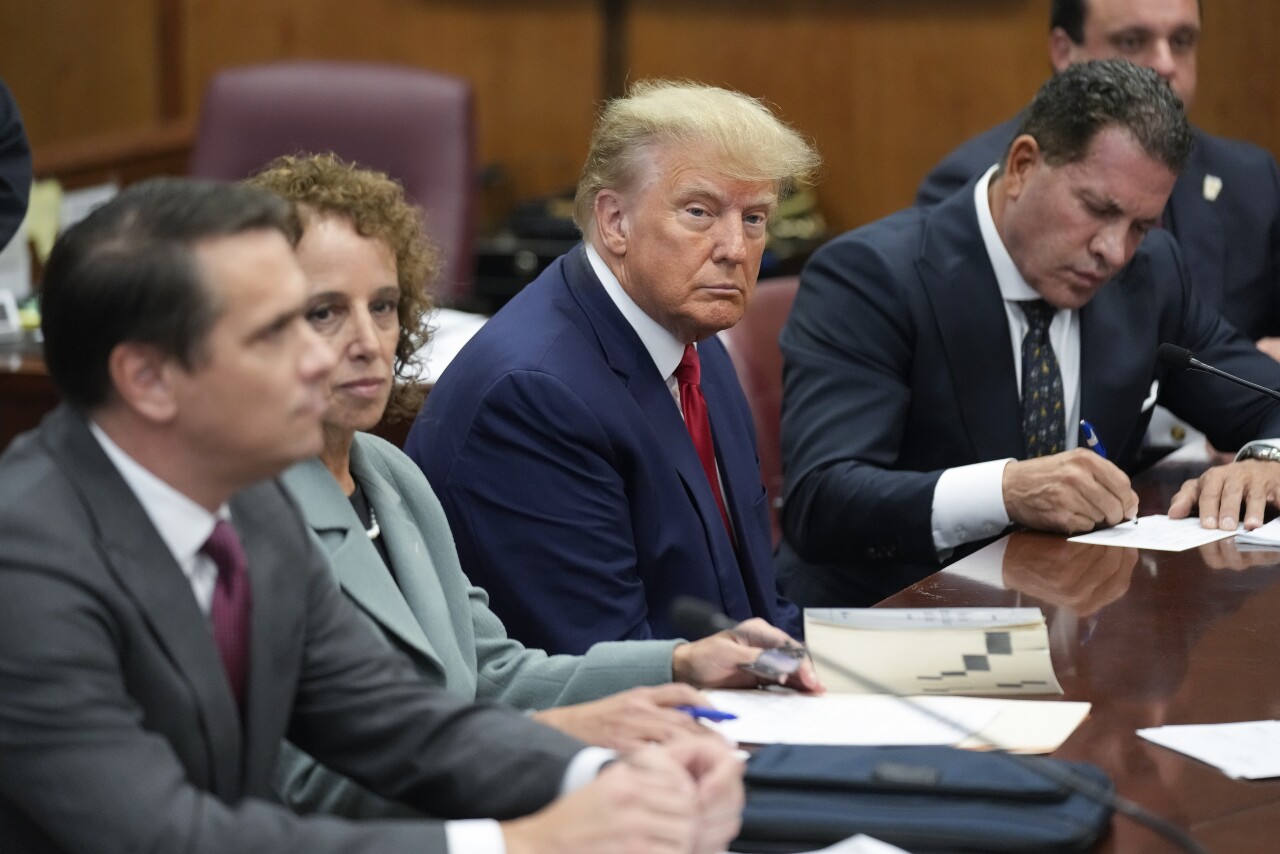 Donald Trump sits at defense table for arraignment in Manhattan court, April 4, 2023