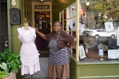 Vanessa outside of her shop on Charles Street