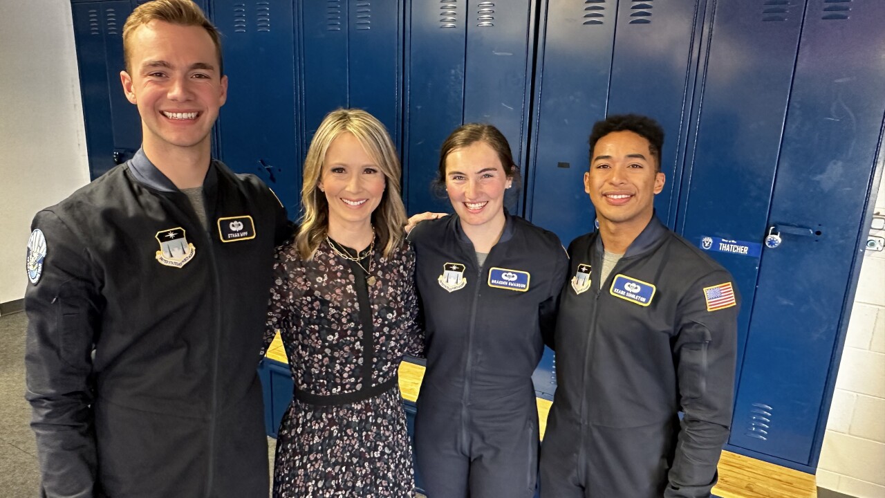 News5's Dianne Derby with Wings of Blue Parachute team members 