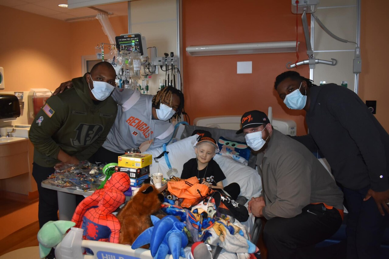 Hudson Klotzbach gets a visit from Bengals players
