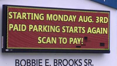 A sign at the Bobbie E. Brooks Sr. Governmental Center in Riviera Beach let residents and visitors to be aware that paid parking was set to resume on Aug. 3, 2026.
