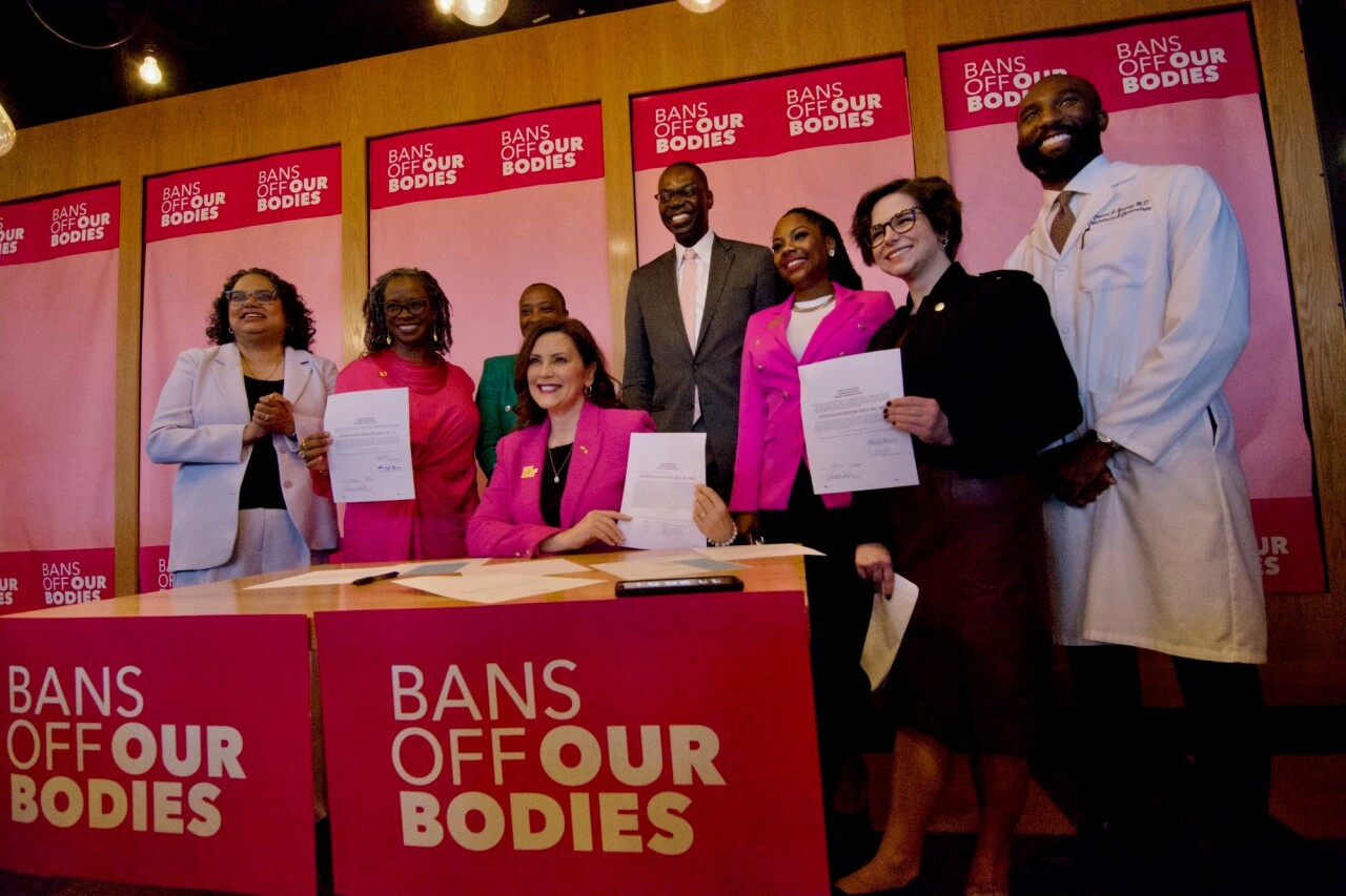whitmer repeals abortion ban.jpg
