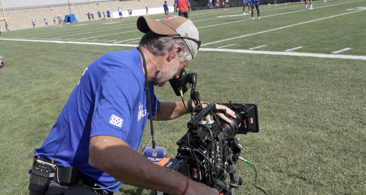 NFL Films cameraman films training camp