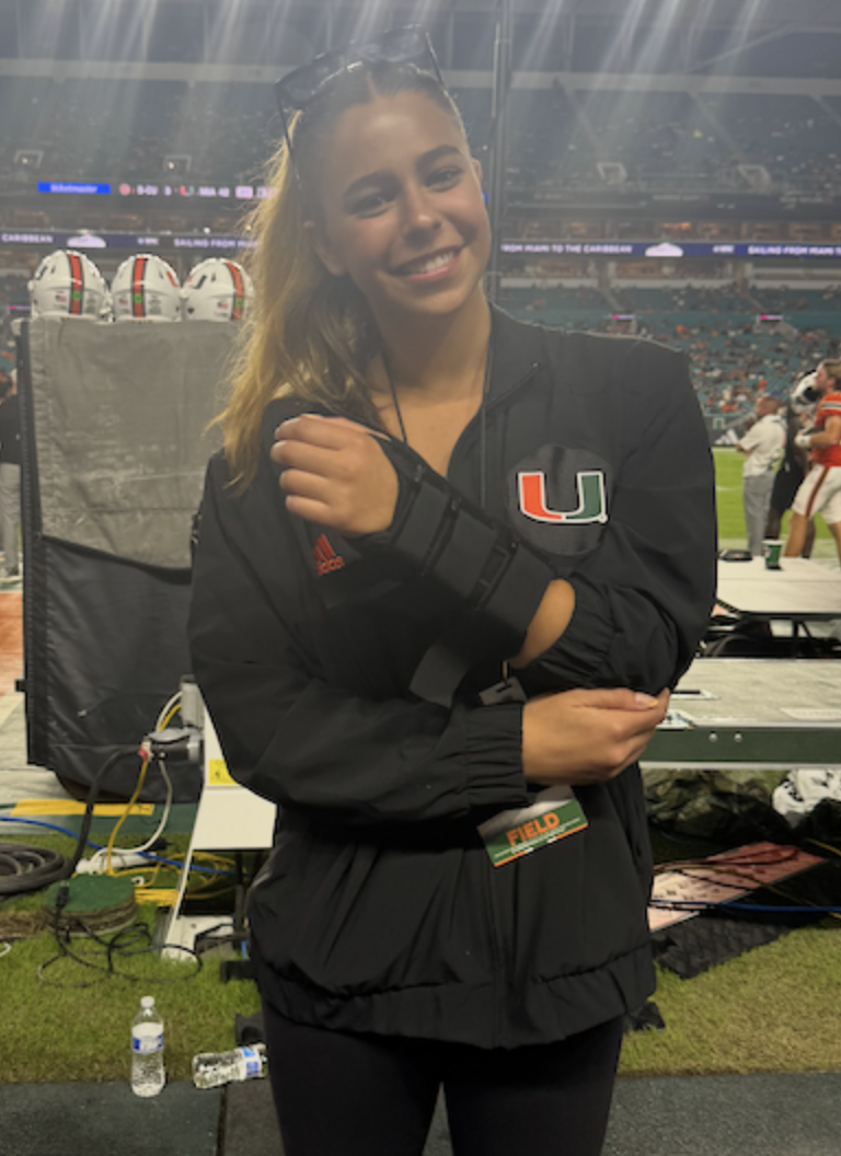 Ashley Freedland after suffering a wrist fracture during a University of Miami football game while working on the sidelines.