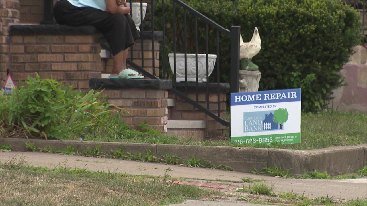 A "home repair" sign sits in a neighbor's yard in the Circle East district.