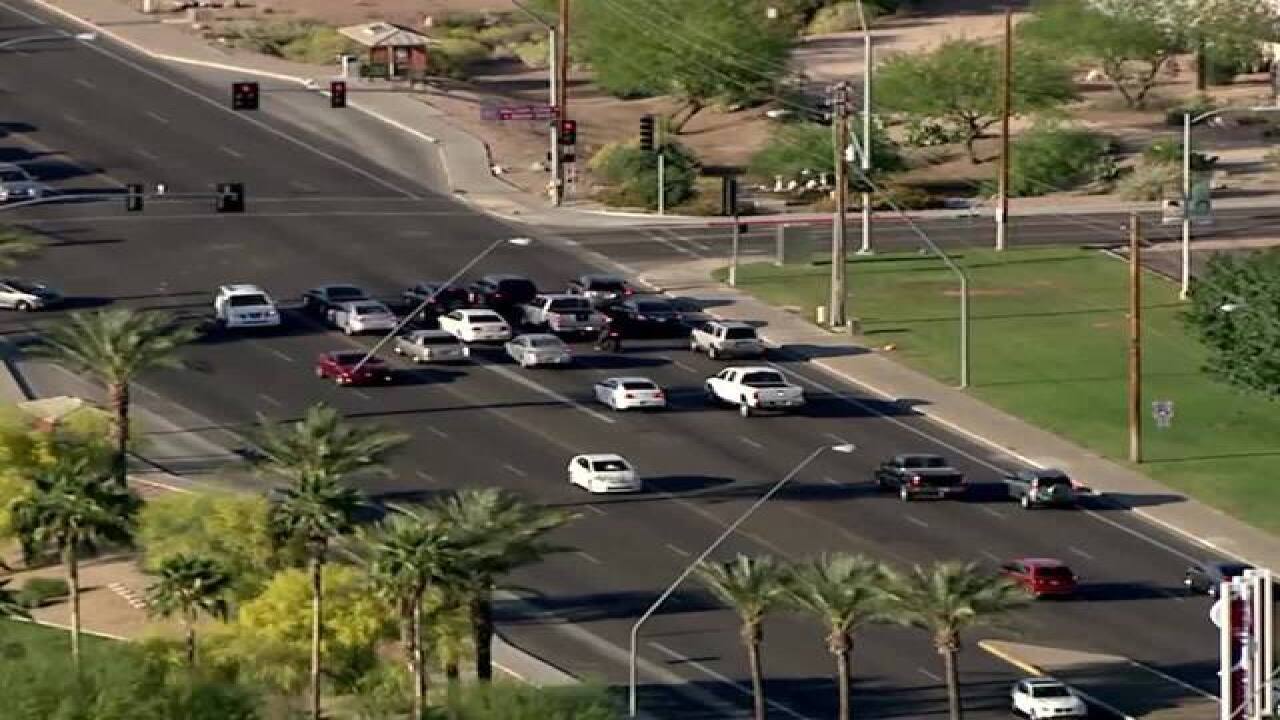 PHOTOS: Police draw guns in East Valley chase
