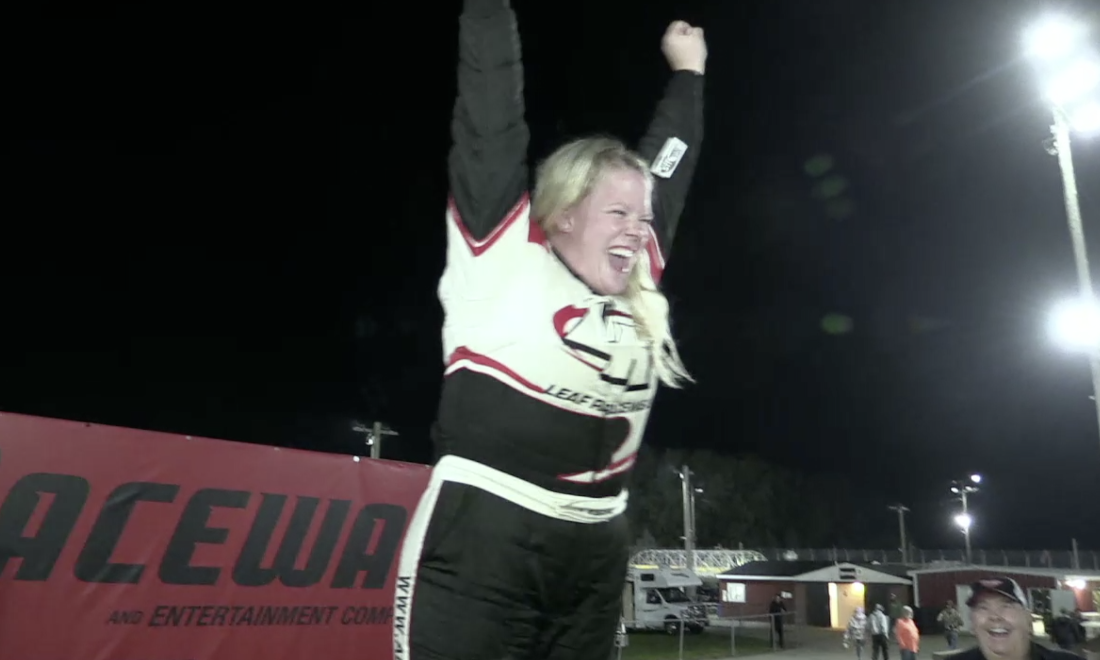 Samantha Stuart celebrates the limited late model victory at Berlin