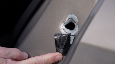 His car was shot at while driving for Lyft. Now, he could be out thousands of dollars. 