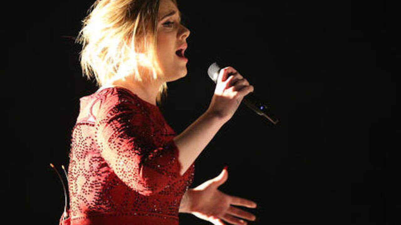Adele swears, restarts during George Michael Grammy tribute