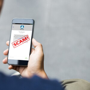 Text,Message,Sms,Scam,Or,Phishing,Concept.,Man,Hands,Using
