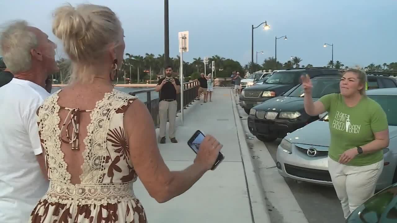 Trump supporters clash with protester outside Mar-a-Lago after FBI raid, Aug. 8, 2022