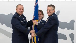 Colonel David Smith (right), Brig Gen Buel Dickson (left) Chief Master Sergeant Amber Westie (center)