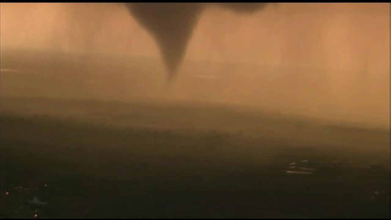PHOTOS: Tornado forms, touches down