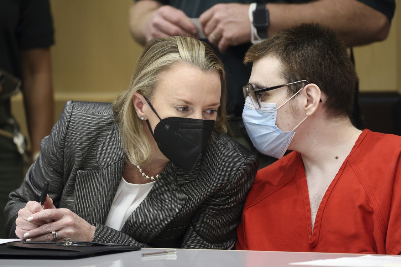 Assistant Public Defender Melisa McNeill listens to Nikolas Cruz in court, Feb. 2, 2022