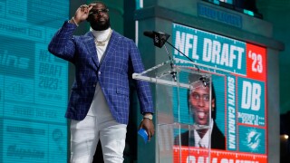 Miami Dolphins' Terron Armstead announces South Carolina defensive back Cam Smith as the selection by the Miami Dolphins during the second round of the NFL football draft, Friday, April 28, 2023, in Kansas City, Mo. (AP Photo/Jeff Roberson)