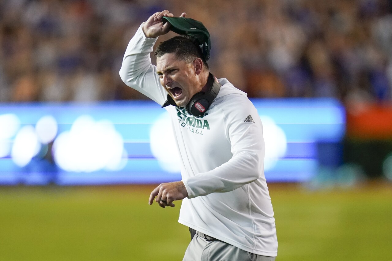 South Florida Bulls head coach Jeff Scott throws cap while disputing call at Florida Gators, Sept. 17, 2022