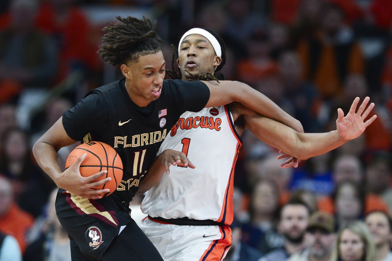 Florida State Seminoles forward Baba Miller defended by Syracuse Orange forward Maliq Brown, Jan. 23, 2024