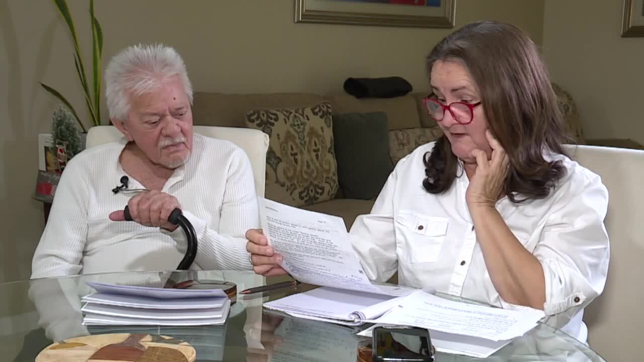 Gloria and Antonio Castro read letter telling them they were overpaid by Social Security Administration, December 2023