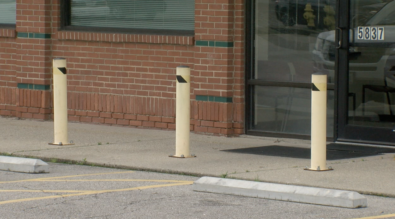 Three barricades in front of Cincinnati Police District Five's temporary station in College Hill.