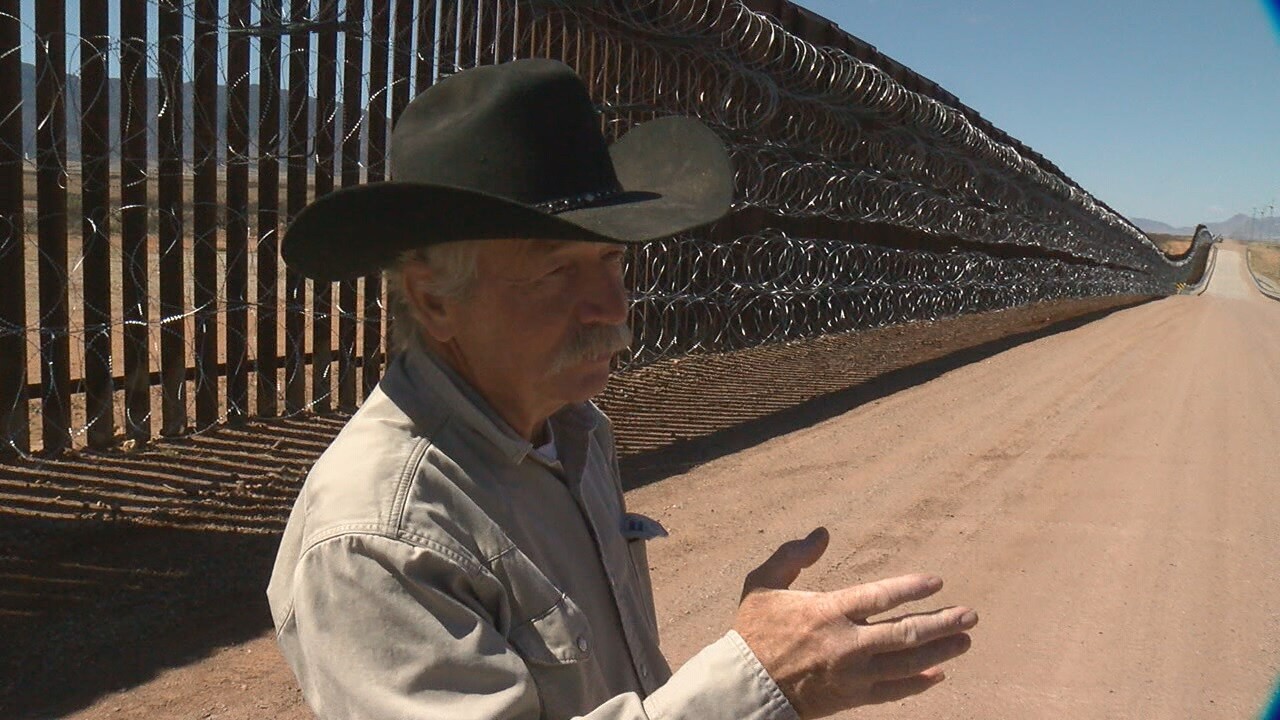 Border-John Ladd-at fence.jpg