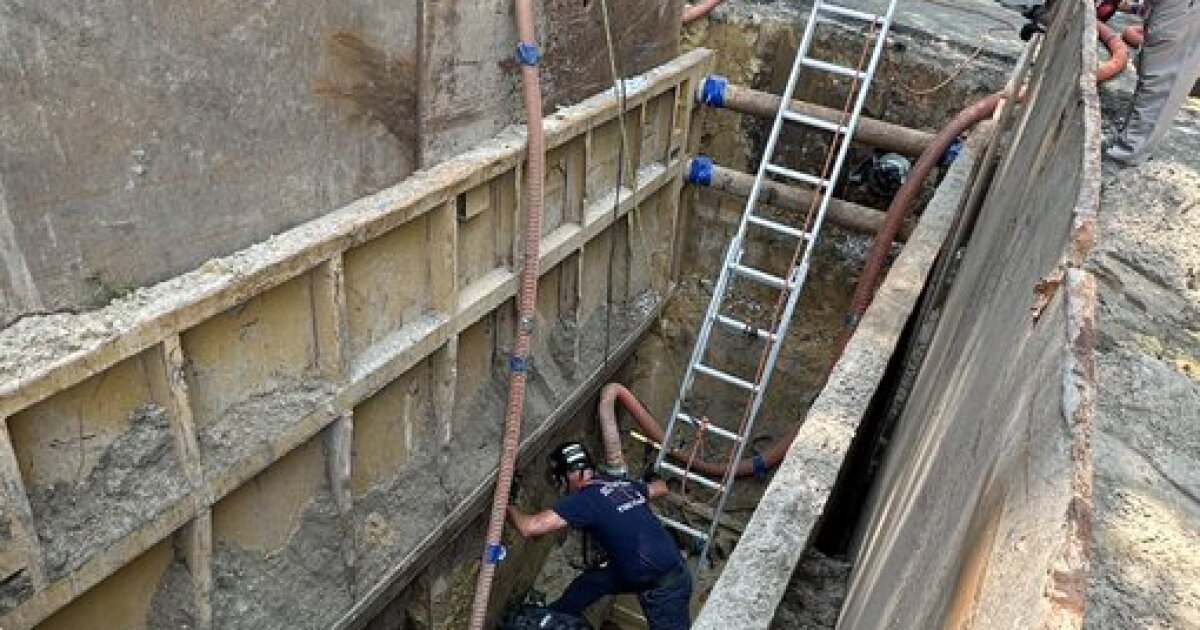 Construction worker found unconscious 15 feet deep in trench box