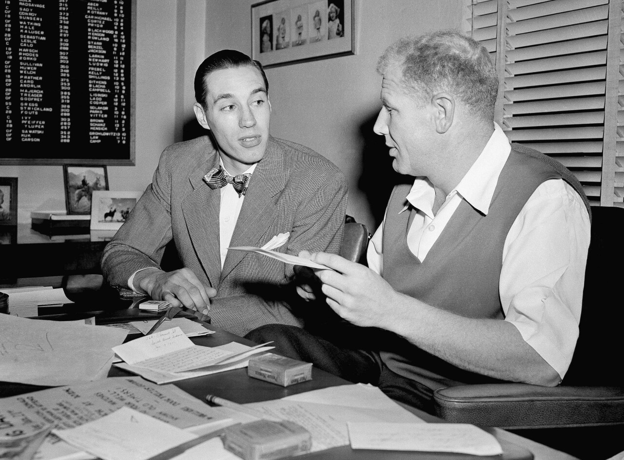 Cleveland owner Bill Veeck with pitcher Bob Feller