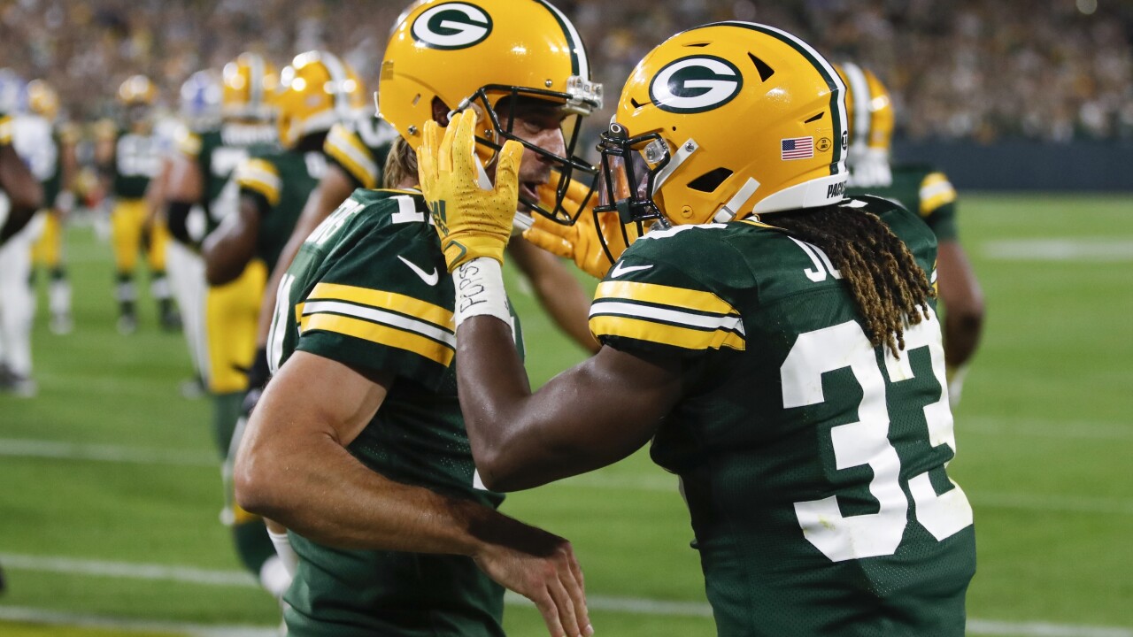 Aaron Rodgers, Aaron Jones Lions Packers Football