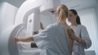 Hospital,Radiology,Room.,Caucasian,Woman,Stands,During,Mammography,Screening,Examination