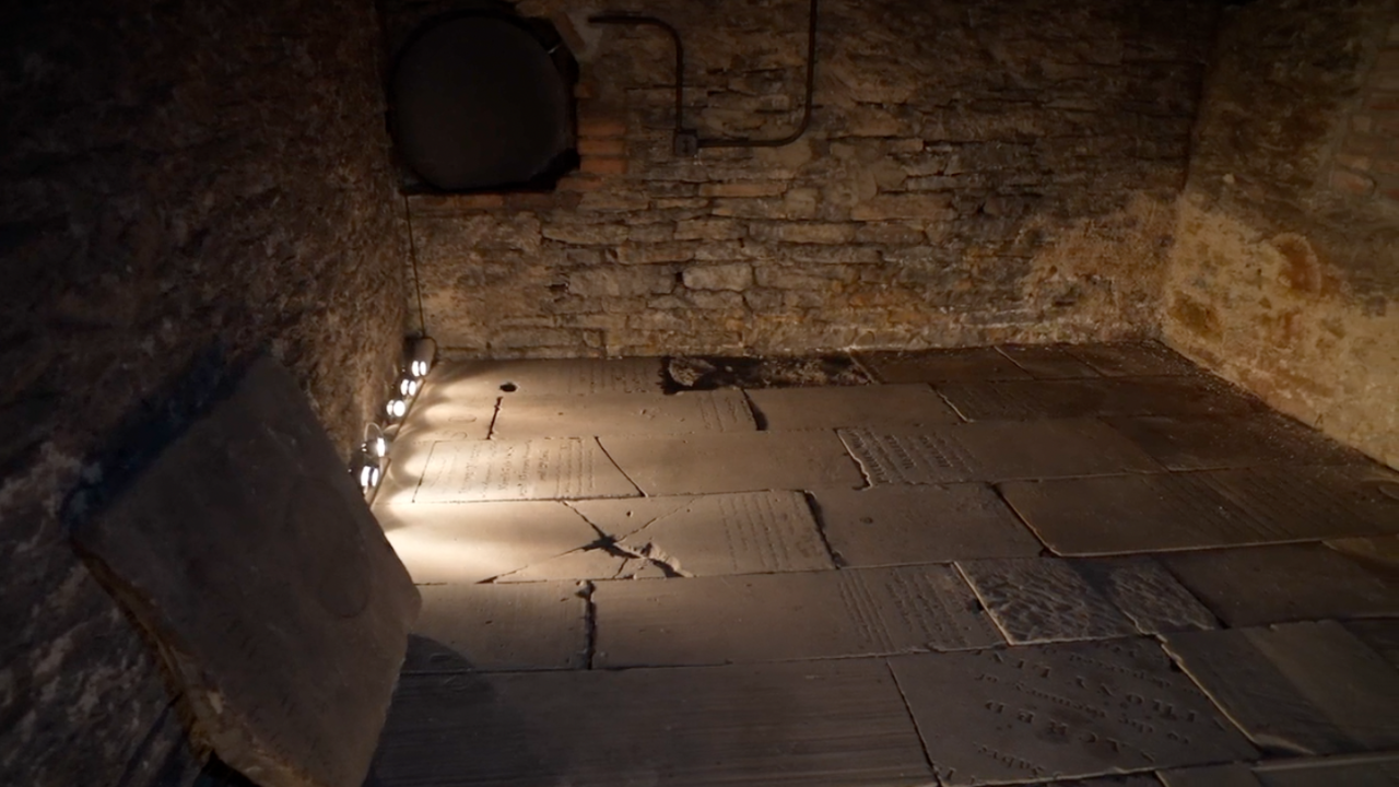 The crypt beneath the altar of St. Francis Seraph Catholic Church holds the remains of 41 mostly Irish immigrants. Their tombstones were laid on the basement floor.