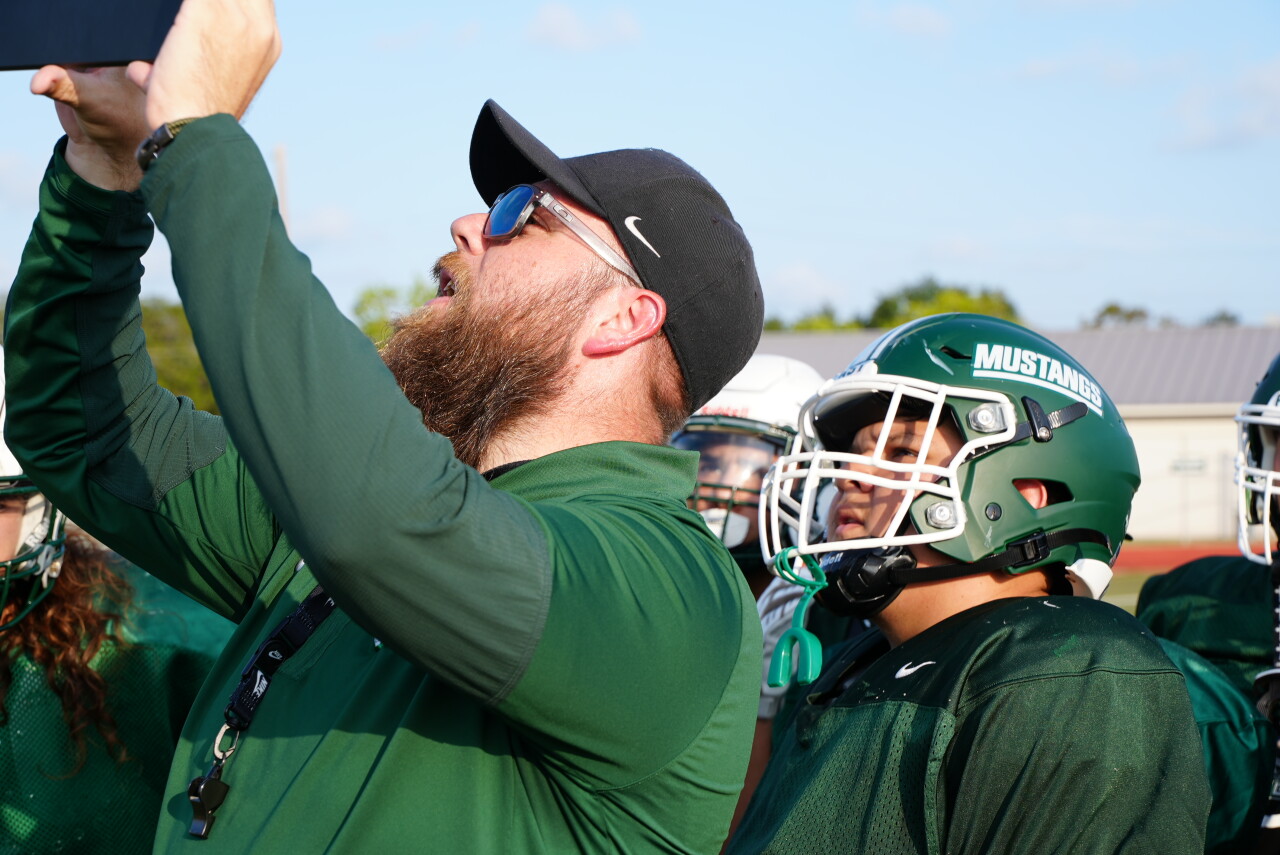 King football head coach Austin Menner