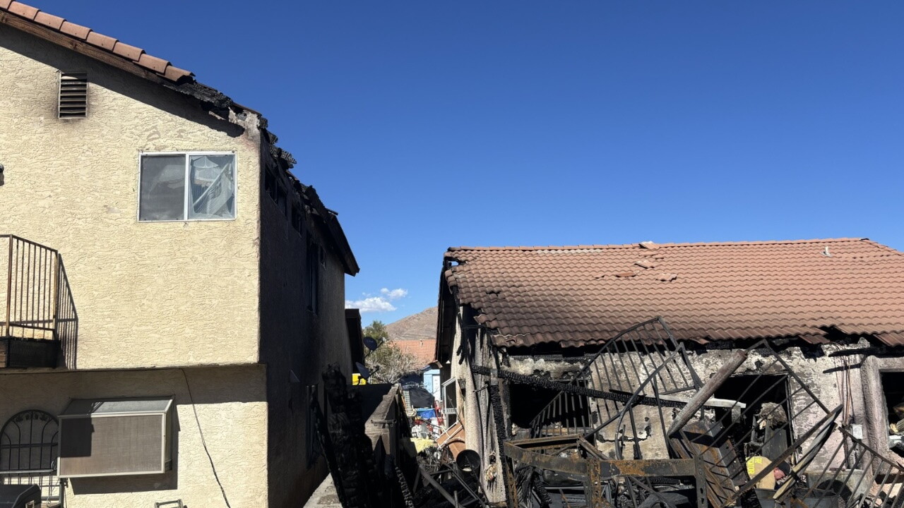 Fire crews respond to two homes on fire in Sunrise Manor