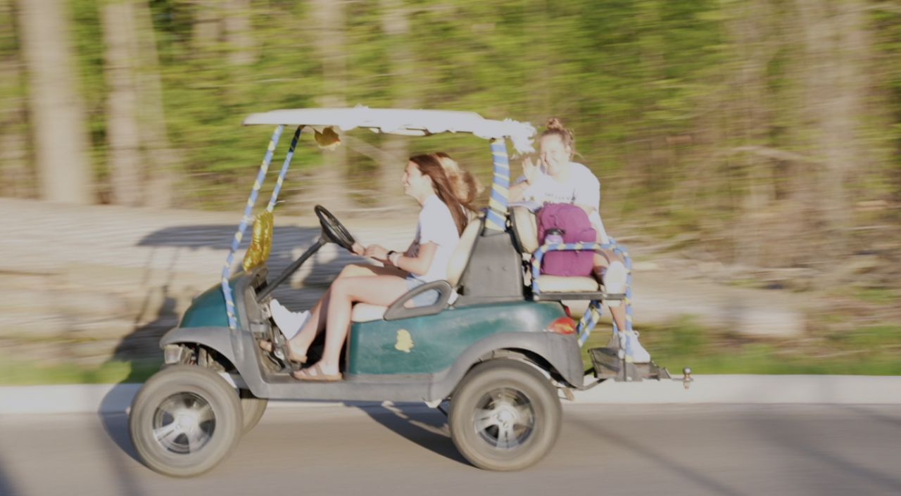 DeWitt seniors ride to school in anything but a car for last day