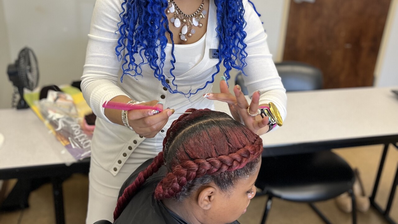 Fishers beauty school teaches African hair braiding Fishers beauty school teaches African hair braiding