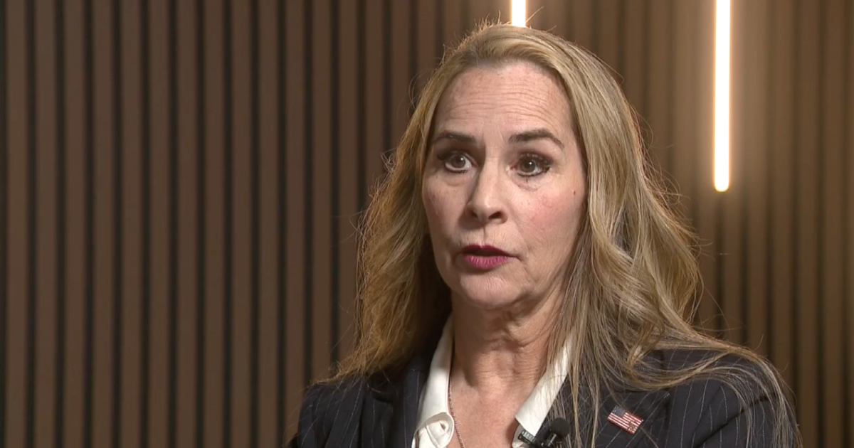 Arizona CD-8 candidate Bernadette Greene-Placentia speaks on sexual assault while repairing campaign sign