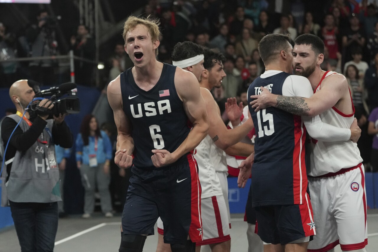 Canyon Barry celebrates winning 3x3 basketball gold medal against Chile, Oct. 23, 2023