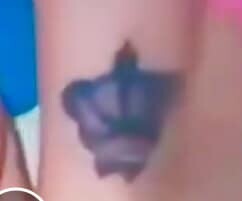 Tattoo on a female suspect accused of child abuse.jpg