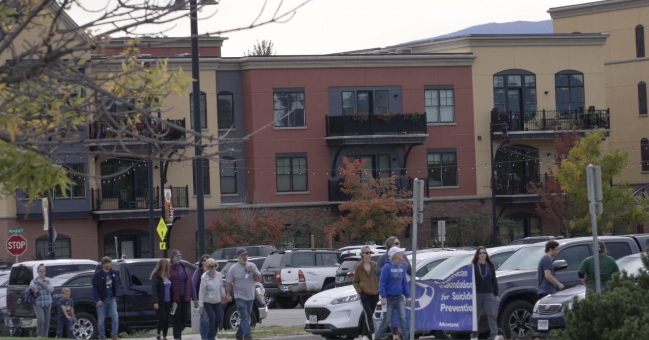 Participants for Sunday's Out of the Darkness event leave Paddleheads Stadium to walk the Kim Williams Trail for suicide prevention.