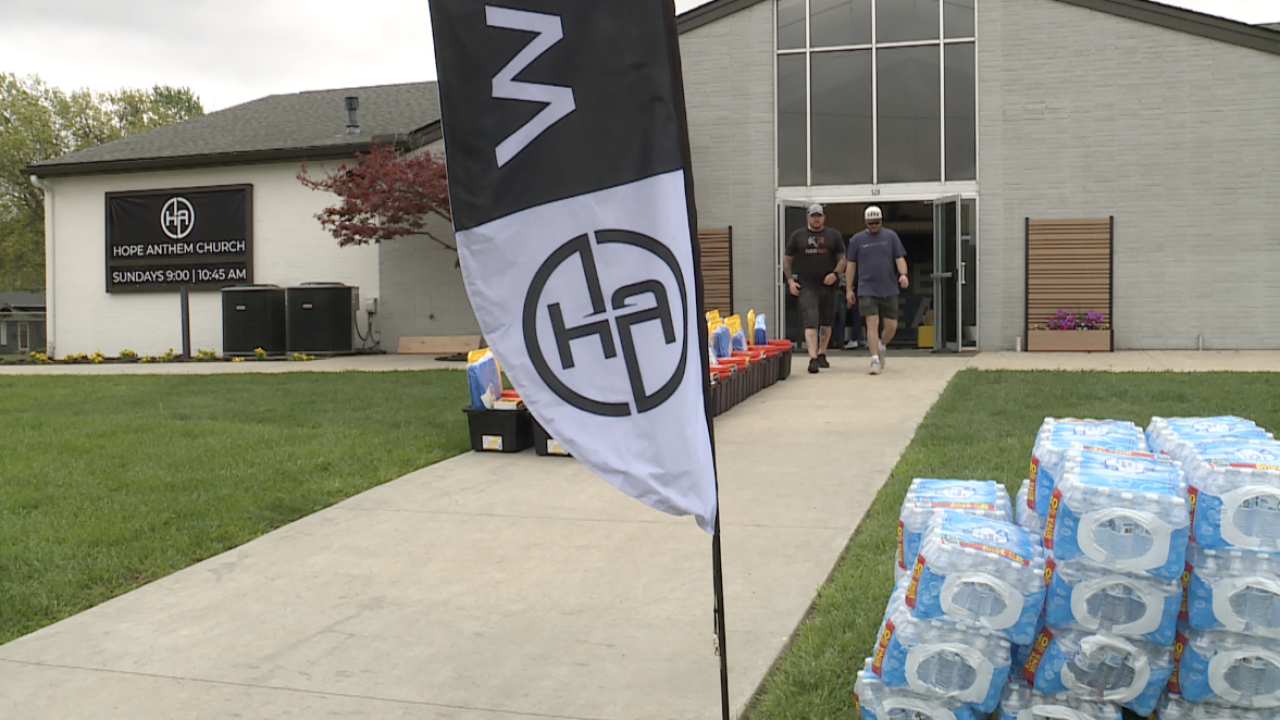  Pastor Cameron Presson, right, and Michael Clutter, walking from Hope Anthem Church in Ottawa, Kan.