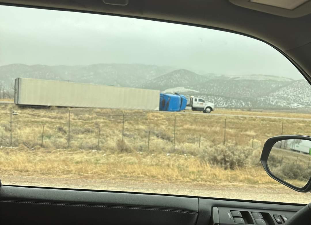 Semi blown over by wind