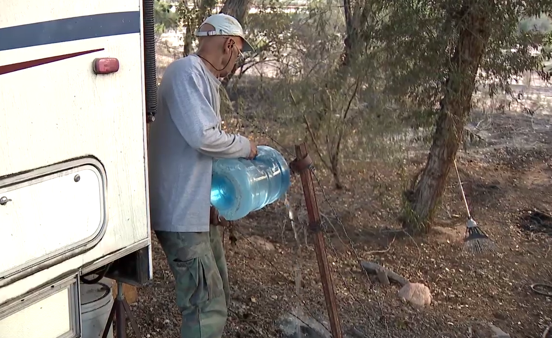 Jones fire neighbor helping