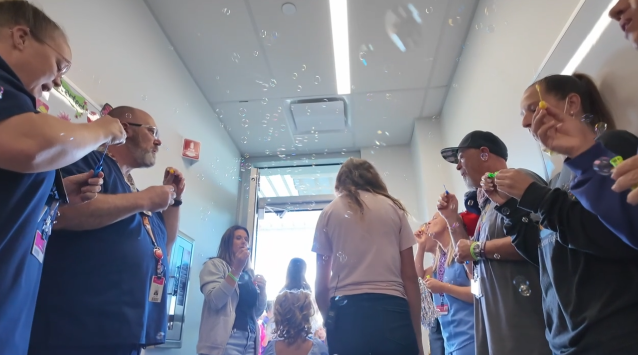 5-year-old rings the bell after her cancer treatment with her ‘Baseball Boys’