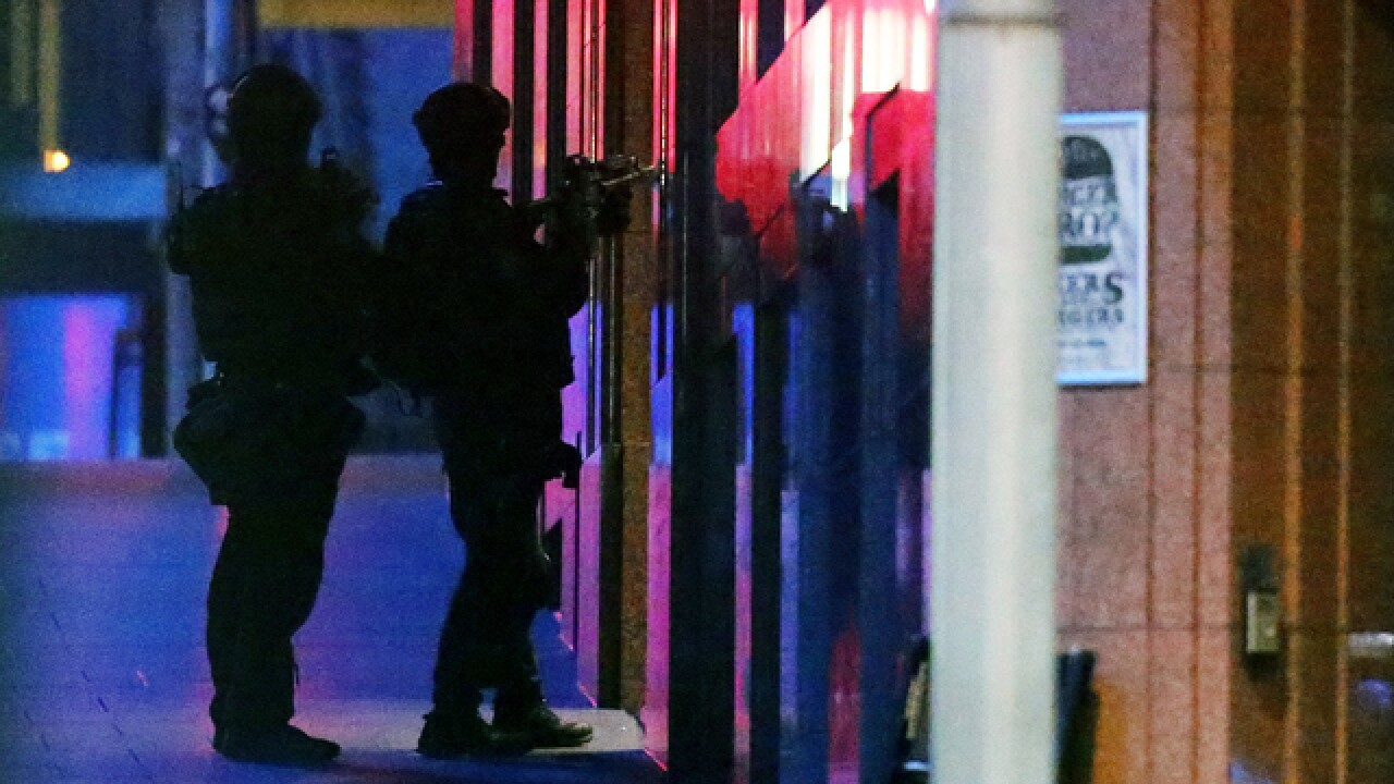 PICS: Standoff at Sydney cafe