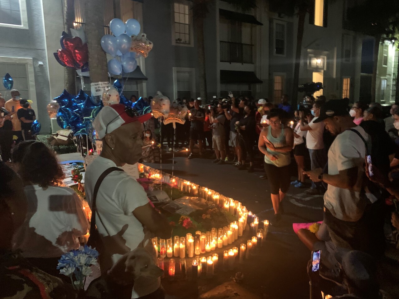 Family and friends of Miya Marcano came together at her apartment in Orlando for a vigil after her body was found in a wooded area Saturday.