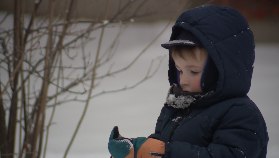 Belton kid playing in snow