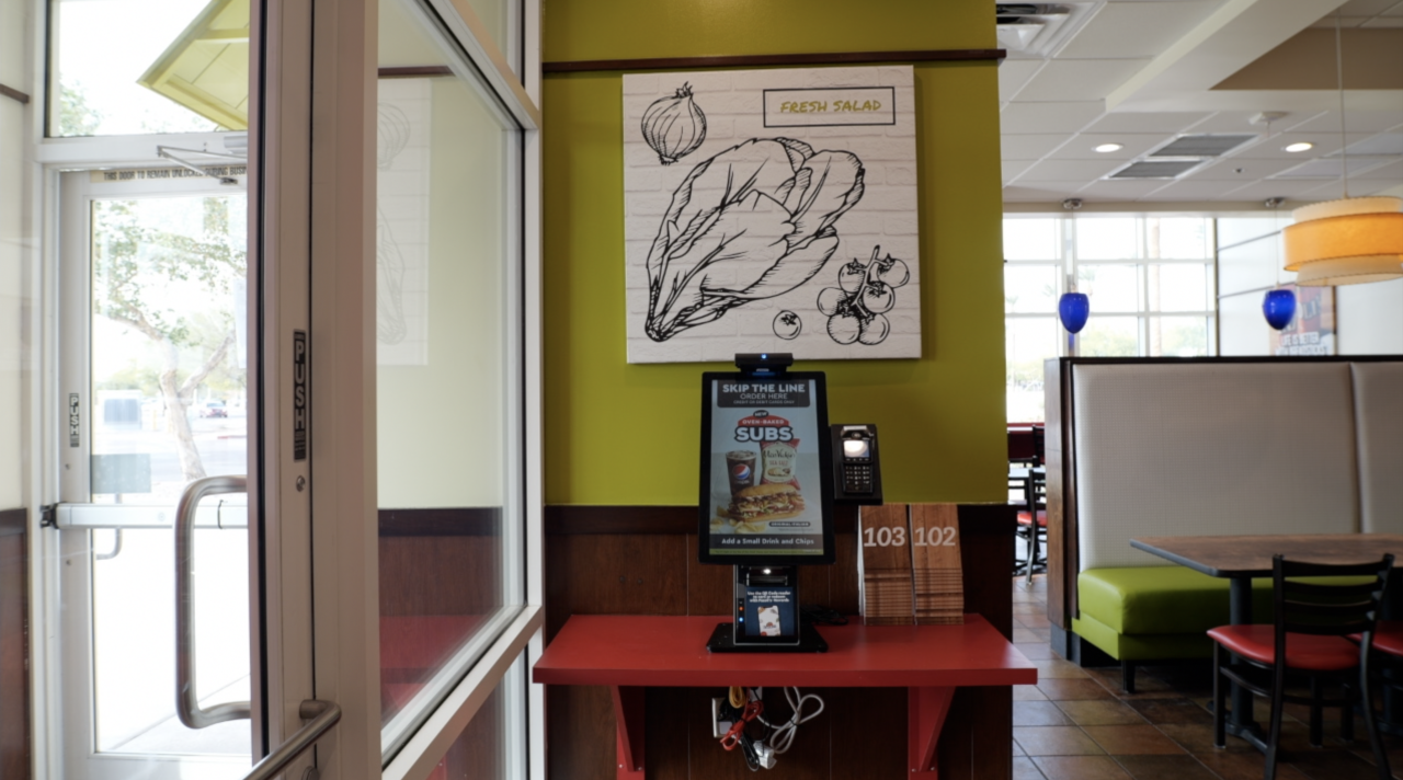 The restaurant has two cashiers and one personal ordering kiosk.