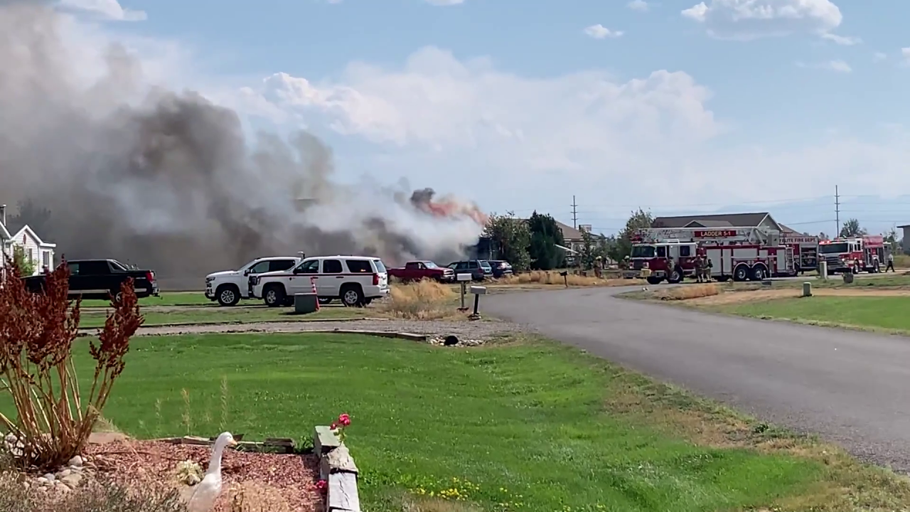 Crews respond to large structure fire in Belgrade