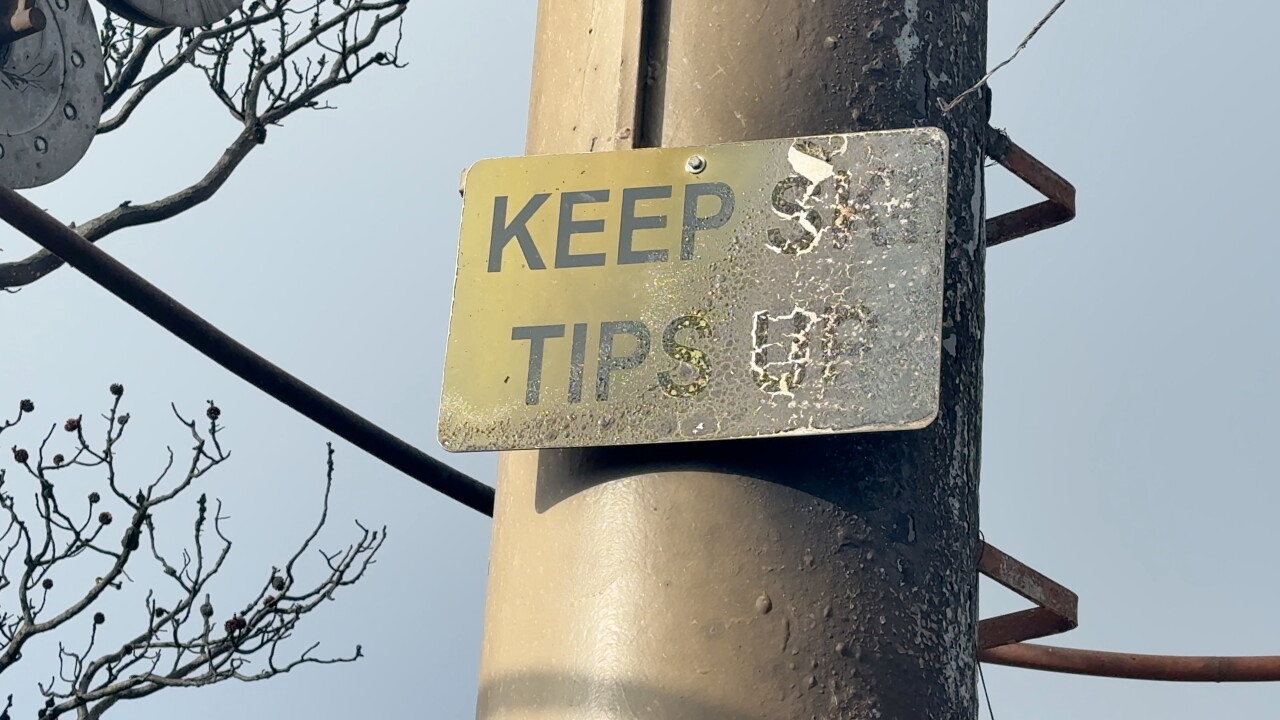 BURNED TIPS UP SIGN.jpeg